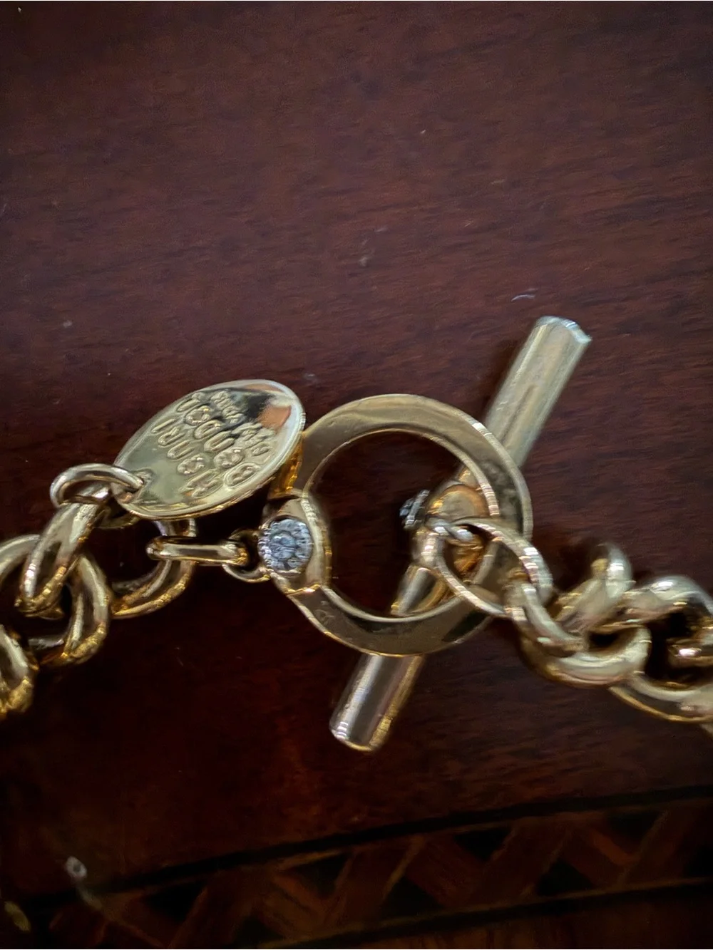 Henri Bendel Gold Tone Bracelet with Green Crystals Toggle Closure 7.5”